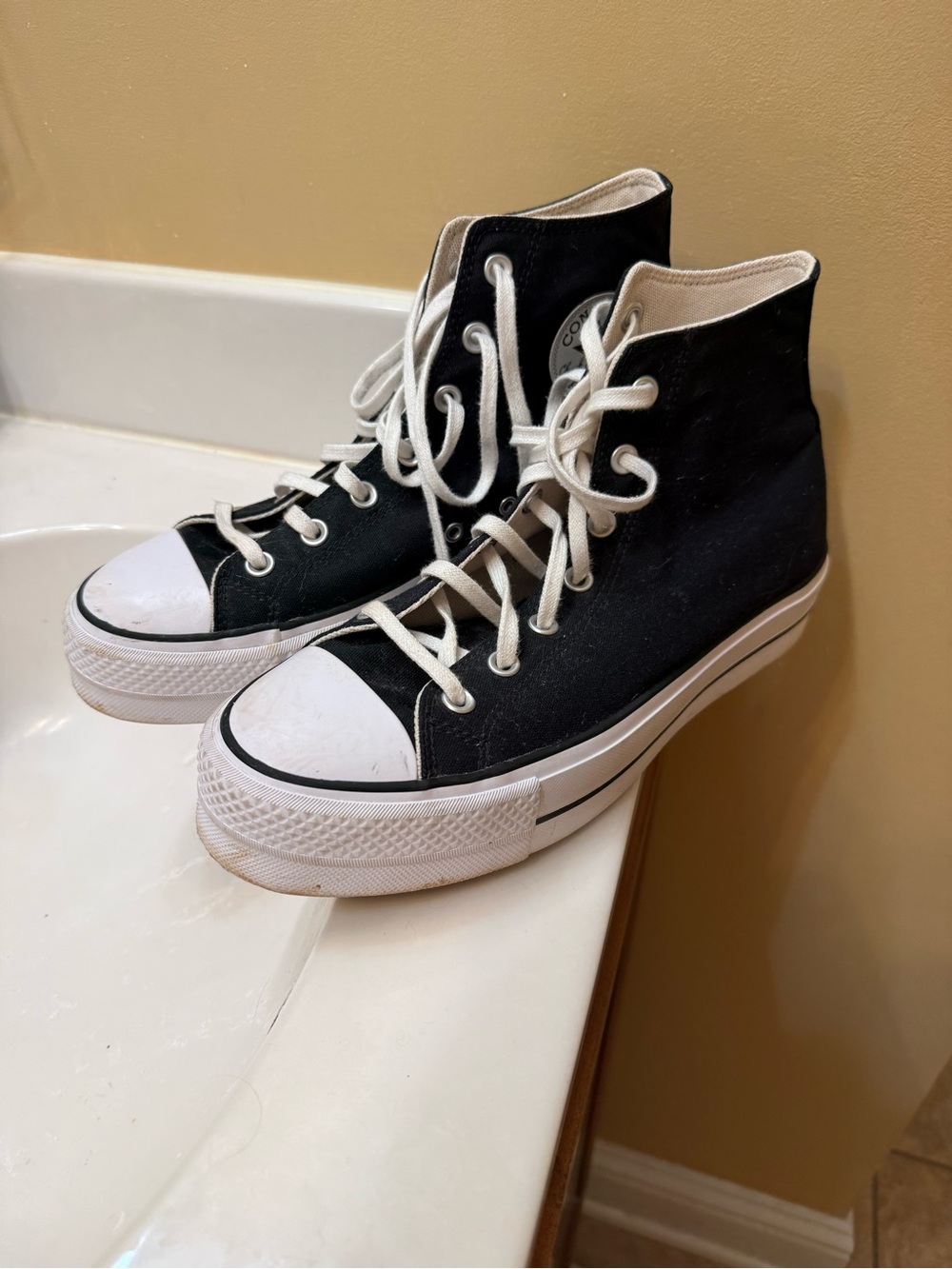 Converse Black and White High-Top Sneakers